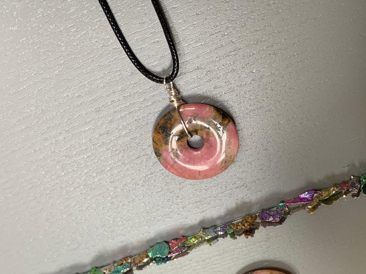Rhodonite Crystal Gemstone Donut Spinner Necklace